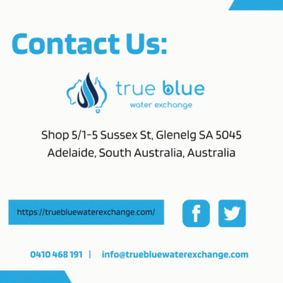 An Advertisement For True Blue Water Exchange Shows An Aerial View Of A River Surrounded By Trees GIF
