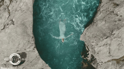 An Advertisement For Wheel Time Shows A Person Swimming In A Body Of Water GIF
