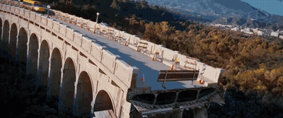 An Aerial View Of A Bridge With A Broken Section In The Middle GIF