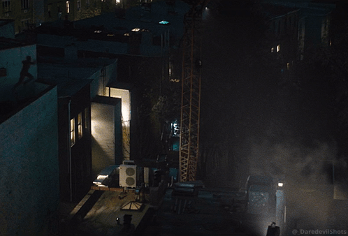 An Aerial View Of A Building With Smoke Coming Out Of It And The Words Daredevil Shots Below It GIF