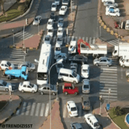 An Aerial View Of A Busy Intersection With The Words Trendizisst On The Bottom GIF