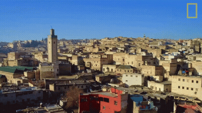 An Aerial View Of A City With A National Geographic Logo On The Bottom Right GIF