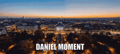 An Aerial View Of A City With Daniel Moment Written On The Top GIF