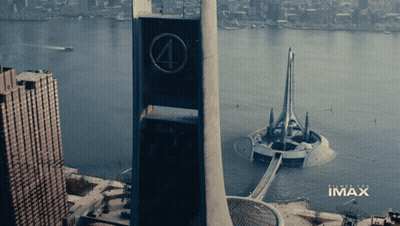 An Aerial View Of A City With Imax Written On The Bottom GIF