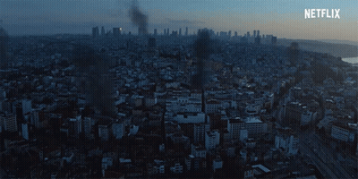 An Aerial View Of A City With Netflix Written On The Bottom Right GIF