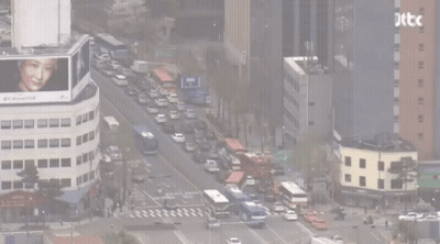 An Aerial View Of A City With The Letters Jtb Visible GIF