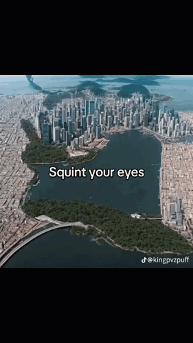 An Aerial View Of A City With The Words " Squint Your Eyes " Below It GIF
