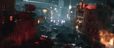An Aerial View Of A Destroyed City With A Sign That Says ' Nn ' On Top Of A Building GIF