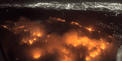 An Aerial View Of A Fire At Night GIF