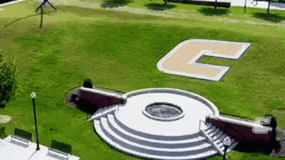 An Aerial View Of A Park With A Large Letter C In The Middle GIF