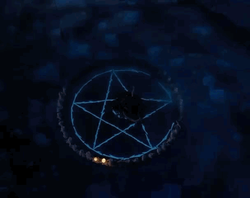 An Aerial View Of A Person In A Pentagram With Candles Around Them . GIF
