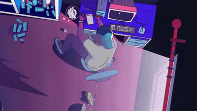 An Aerial View Of A Person Sitting At A Desk With A Computer And A Bowl Of Popcorn GIF