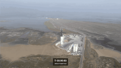 An Aerial View Of A Rocket Being Launched With T 00 00 01 Displayed On The Screen GIF