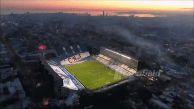 An Aerial View Of A Soccer Stadium With The Letters Cnf On The Side GIF