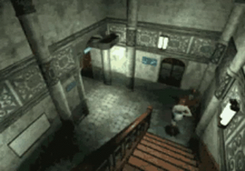 An Aerial View Of A Staircase In A Building With A Sign On The Wall That Says ' Elevator ' GIF