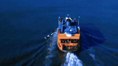An Aerial View Of The New York City Skyline With The Twin Towers In The Distance GIF