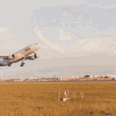 An Airitalia Plane Is Flying Through The Sky GIF