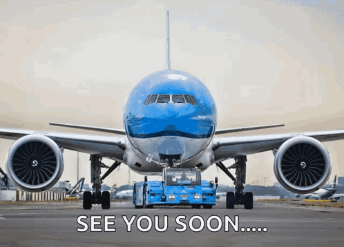 An Airplane Is Being Towed On A Runway With The Words See You Soon GIF