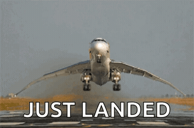 An Airplane Is Taking Off From A Runway And The Words Just Landed Are Below It GIF
