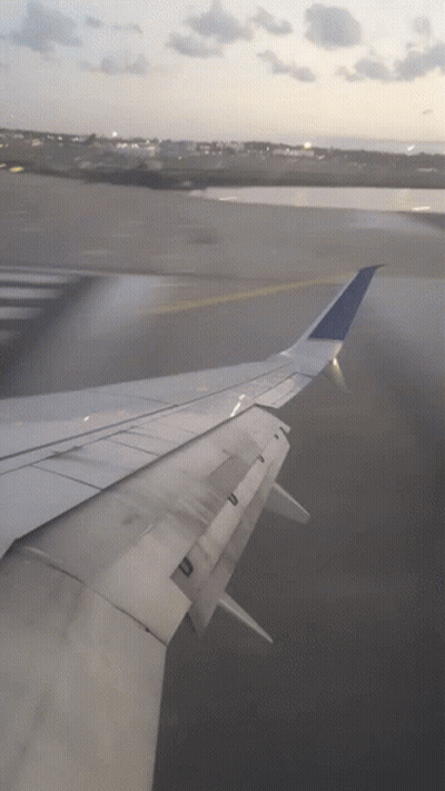 An Airplane Wing With The Letter U On The Bottom GIF