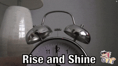 An Alarm Clock With The Words Rise And Shine Written On It GIF