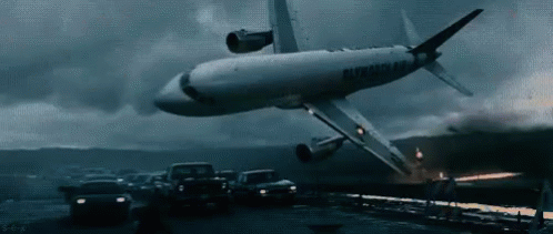 An American Airlines Plane Is Flying Over A Busy City GIF