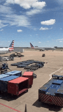 An American Airlines Plane Sits On The Tarmac GIF
