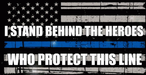 An American Flag With The Words " I Stand Behind The Heroes Who Protect This Line " On It GIF