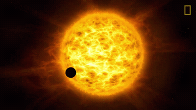 An Artist 'S Impression Of A Sun With A Black Planet In The Middle GIF
