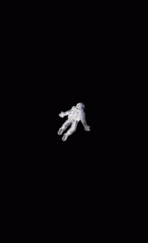 An Astronaut Is Flying Through A Galaxy With Stars GIF