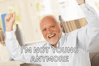 An Elderly Man With A Beard Is Making A Funny Face And Saying `` I 'M Not Young Anymore '' . GIF