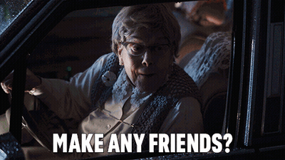 An Elderly Woman Driving A Car With The Words Make Any Friends GIF