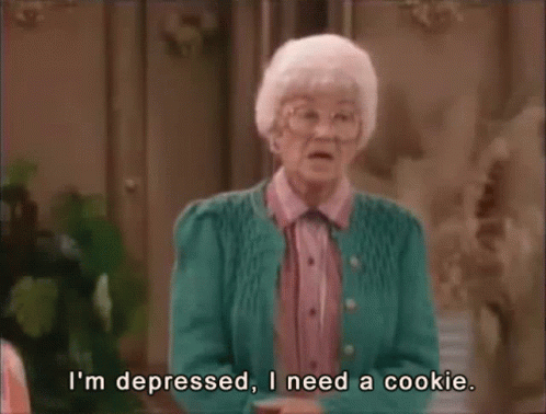An Elderly Woman In A Green Sweater Says I 'M Depressed I Need A Cookie GIF