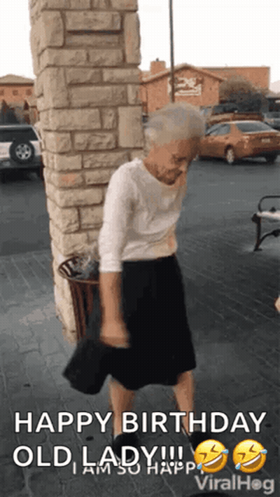An Elderly Woman Is Dancing In Front Of A Brick Wall With The Caption Happy Birthday Old Lady I Am So Happy . GIF