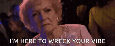 An Elderly Woman Is Sitting In A Crowded Room And Says `` I 'M Here To Wreck Your Vibe '' GIF