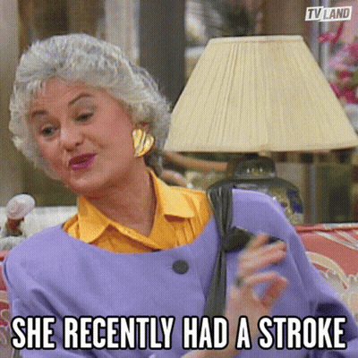 An Elderly Woman Is Sitting On A Couch With A Lamp And A Caption That Says She Recently Had A Stroke . GIF