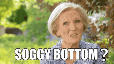 An Elderly Woman Says Soggy Bottom In Front Of A Tree GIF