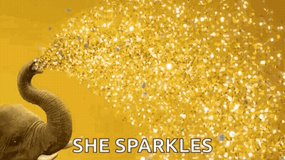 An Elephant Is Blowing Gold Confetti Out Of Its Trunk On A Yellow Background . GIF