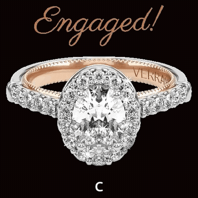 An Engagement Ring With The Word Engaged Written Above It GIF