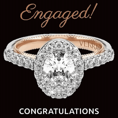 An Engagement Ring With The Words Engaged Congratulations Written Above It GIF