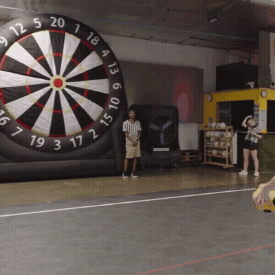 An Inflatable Dart Board With The Number 19 On The Center GIF