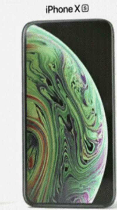An Iphone Xs Is Shown With A Green And Purple Planet On The Screen GIF