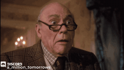 An Old Man Wearing Glasses And A Suit Has Discord A Million Tomorrows Written On The Bottom Right GIF