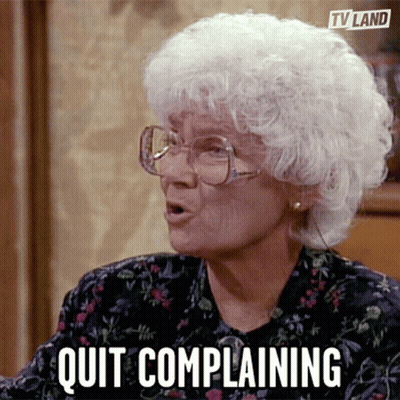 An Old Woman With Glasses Says Quit Complaining In A Tv Land Ad GIF