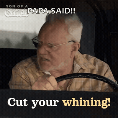 An Older Man Driving A Car With The Words Cut Your Whining Below Him GIF