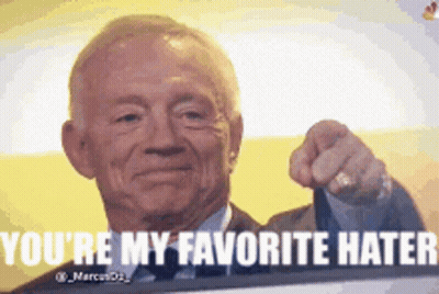 An Older Man In A Suit And Tie Is Pointing At The Camera And Says You 'Re My Favorite Hater . GIF