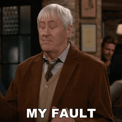 An Older Man In A Suit And Tie Says My Fault GIF