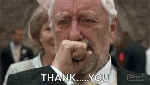 An Older Man Is Crying And Saying `` Thank You '' While Covering His Mouth With His Hand . GIF