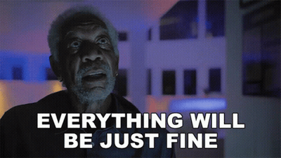 An Older Man Says Everything Will Be Just Fine In Front Of A Building GIF
