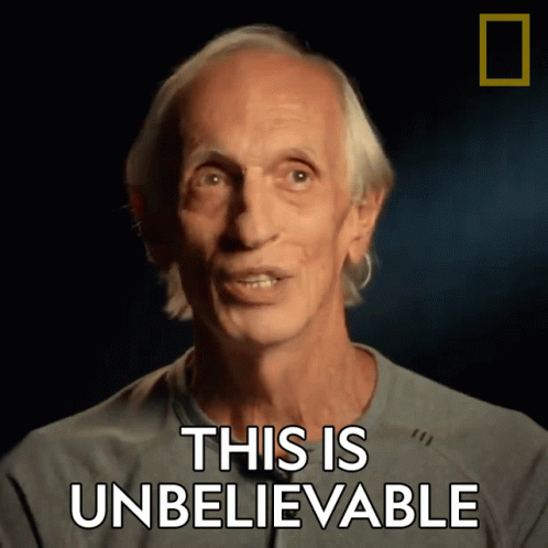 An Older Man Says This Is Unbelievable In A Dark Room GIF